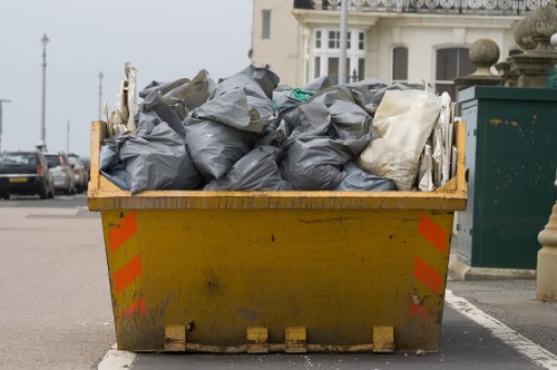 Residents disposing of old furniture in Parsons Green