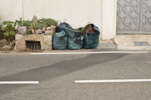 Professional team clearing garage clutter