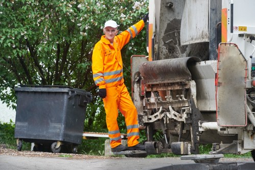Team efficiently removing construction debris in a Parsons Green project